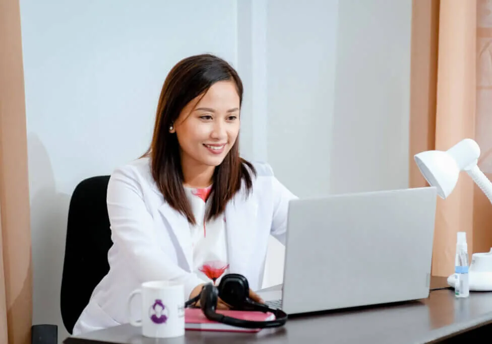 Healthcare assistant working in an office
